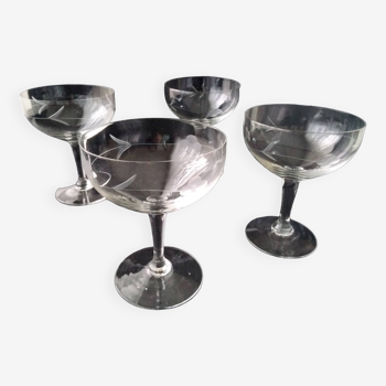 4 vintage champagne glasses in ground glass