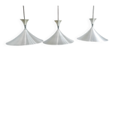 Set of three vintage metal pendants from the 1970s.