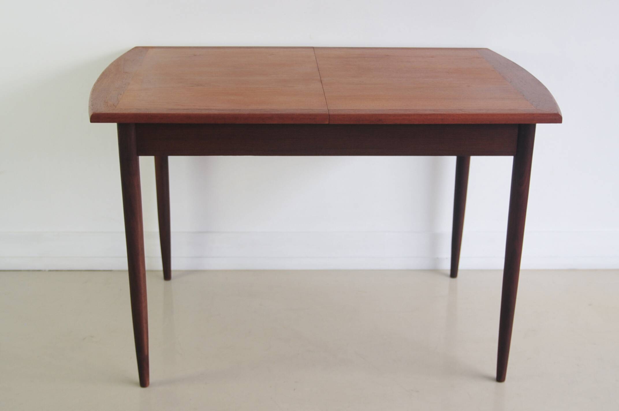 Folding teak dining table
