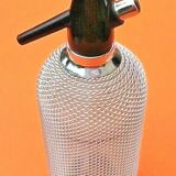 Seltz water siphon Glass body harmoniously meshed with translucent filaments