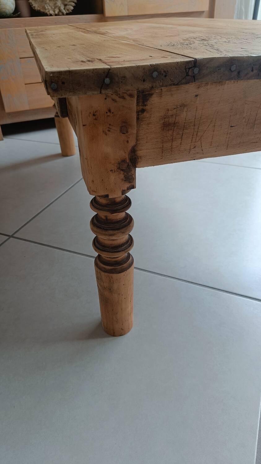 Raw wood coffee table in a country style