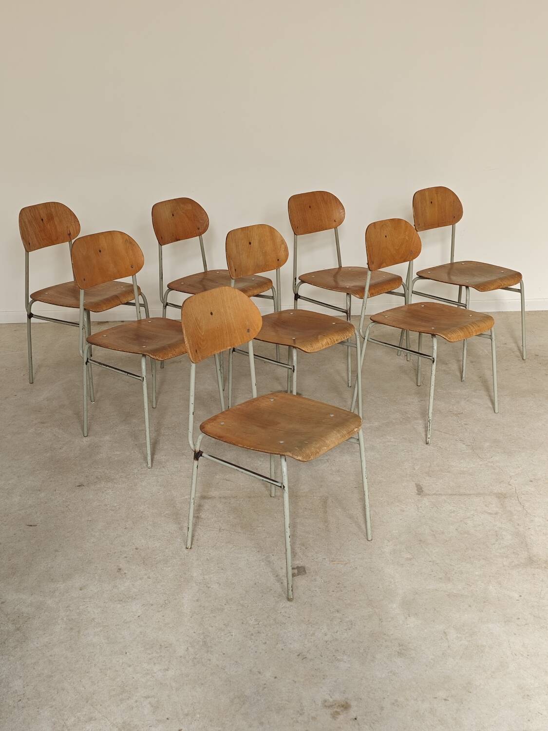 Set of 8 metal and wood school chairs  
Former Czechoslovakia 1960