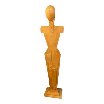 Silhouette en bois sur socle type mannequin jambe et tete articulees