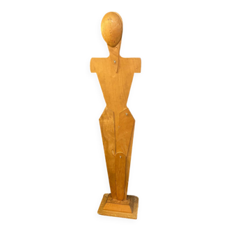 Wooden silhouette on mannequin-type base, articulated leg and head