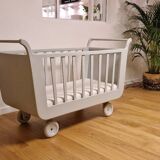 Renovated old cot with wheels