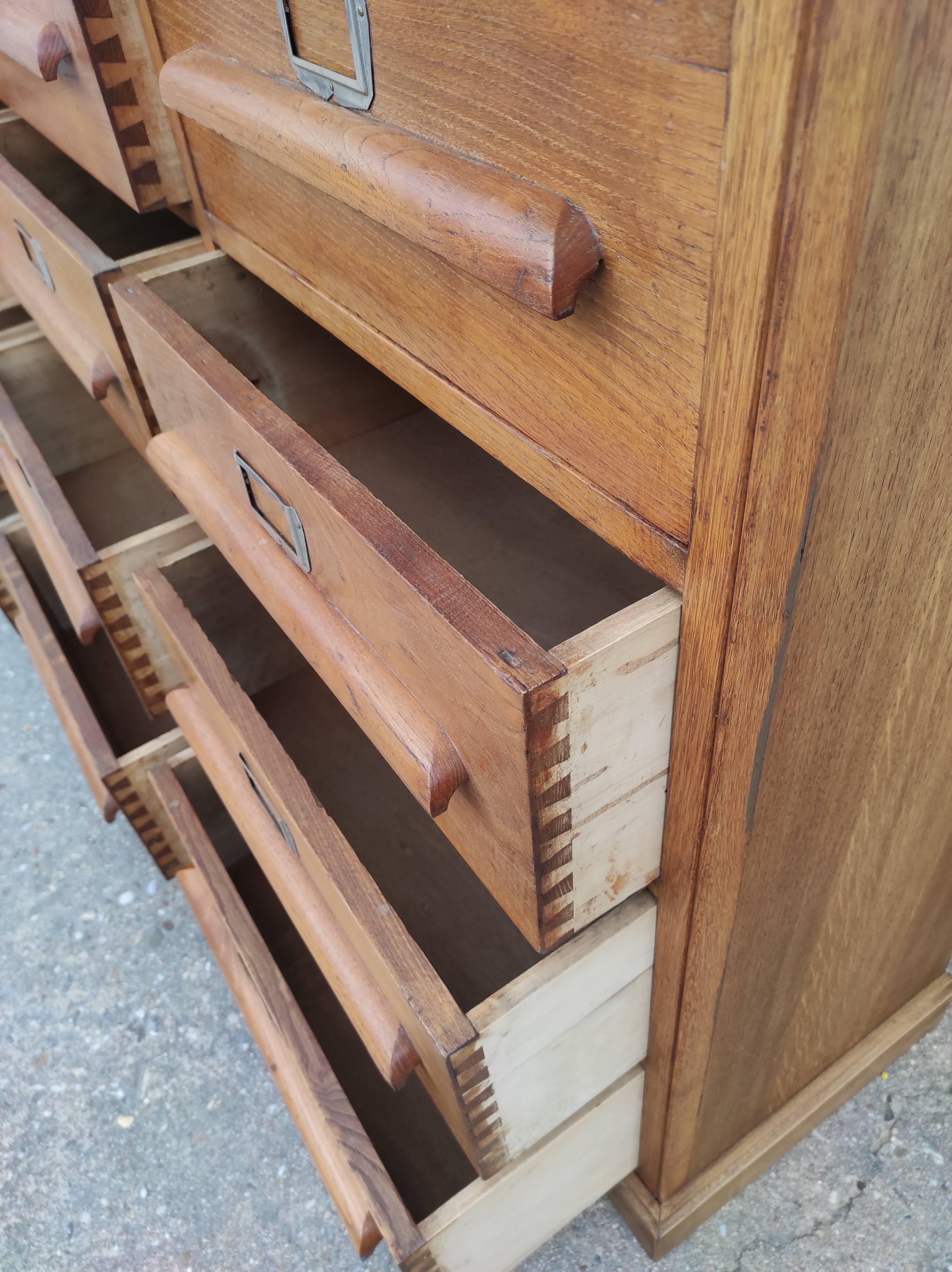Trade furniture with 12 drawers in gilded oak