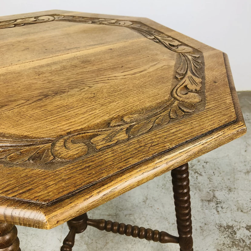 Carved antique wooden table with 8 sides