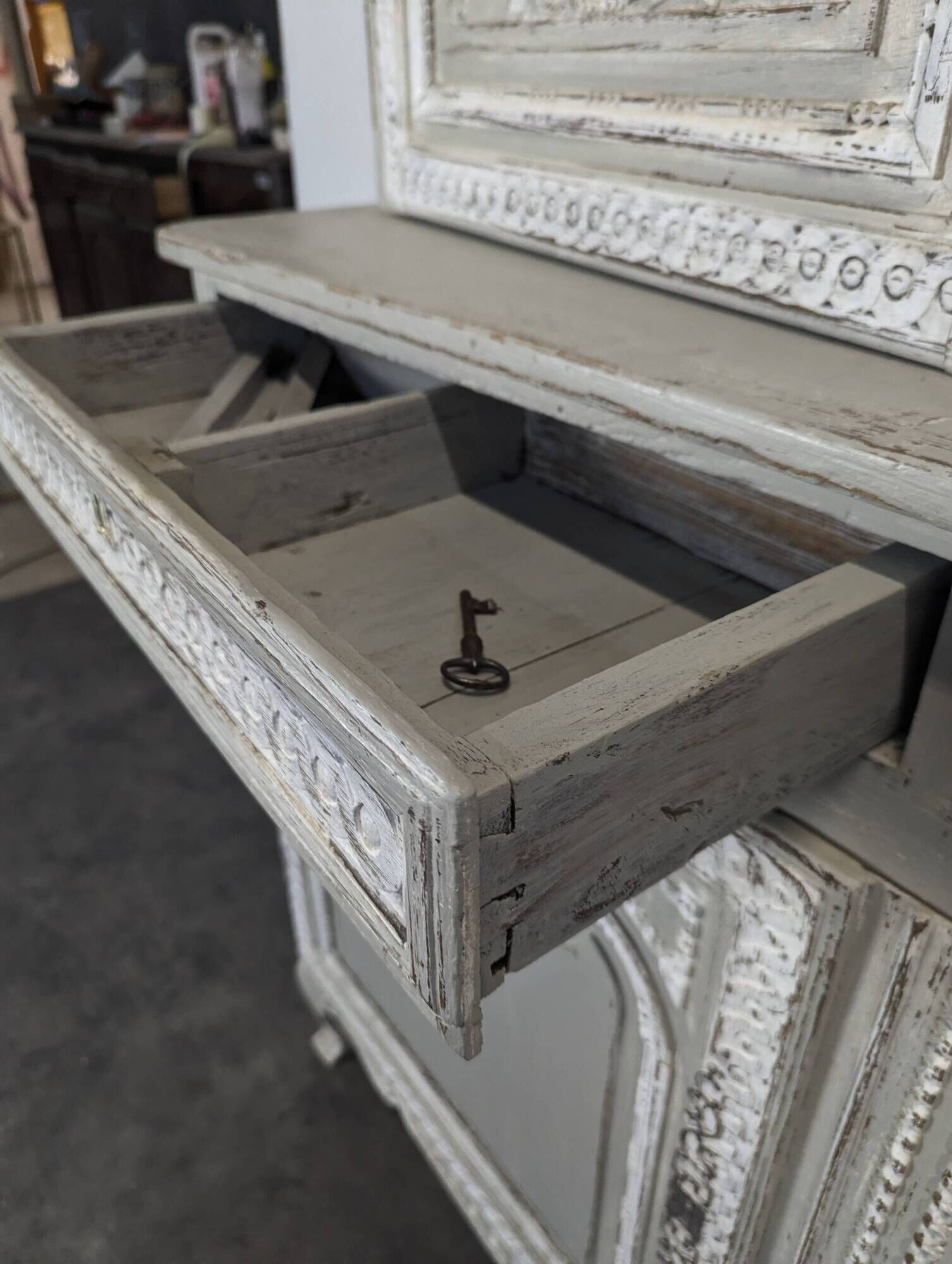 Two-body glass buffet in patinated grey and white oak.