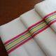 3 old linen cotton tea towels with vintage bedding