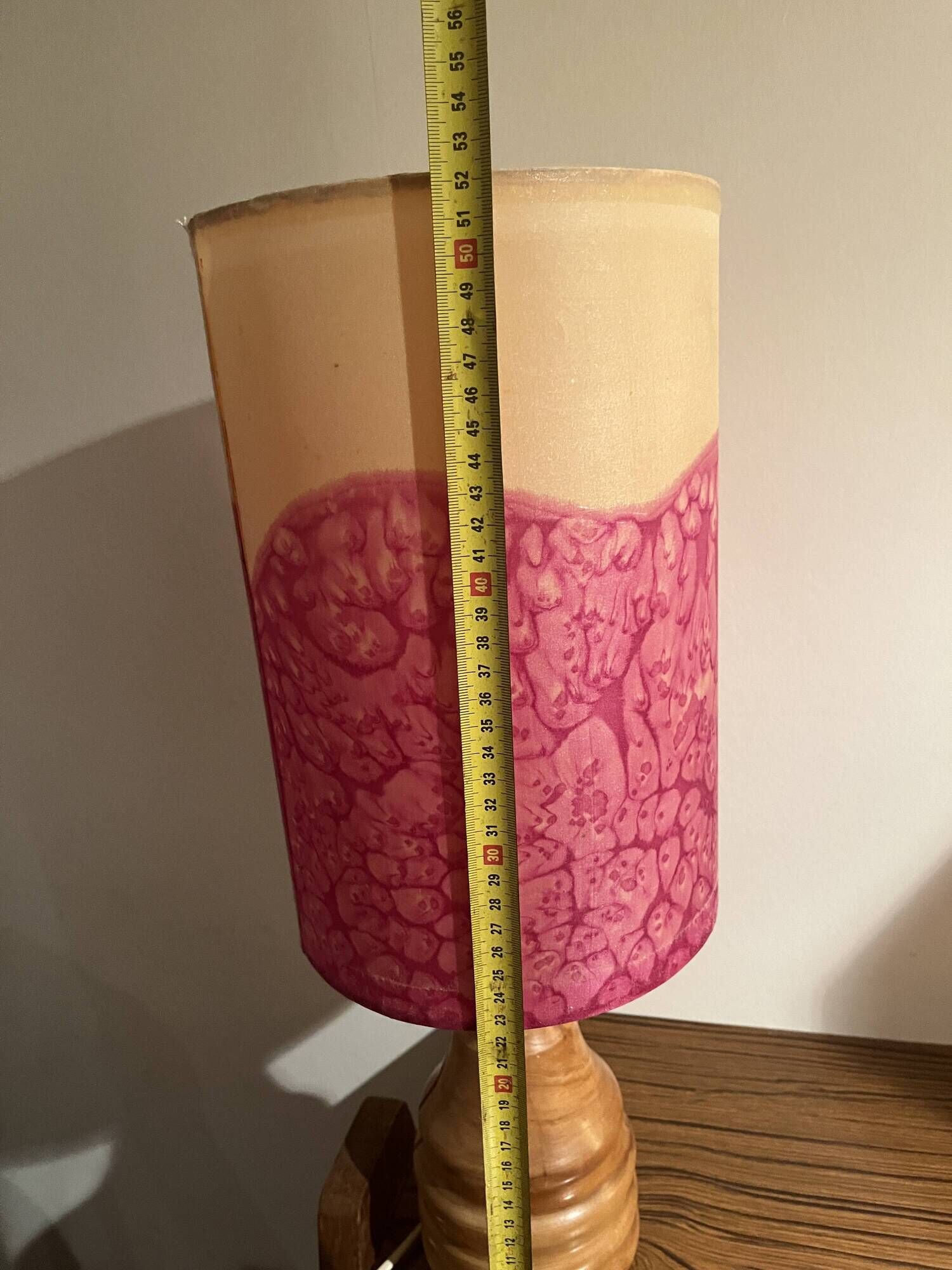 Vintage lamp with a carved wooden base from the 1970s.
