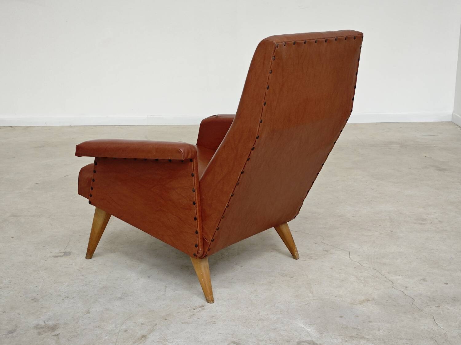Camel brown imitation leather armchair, France 1960