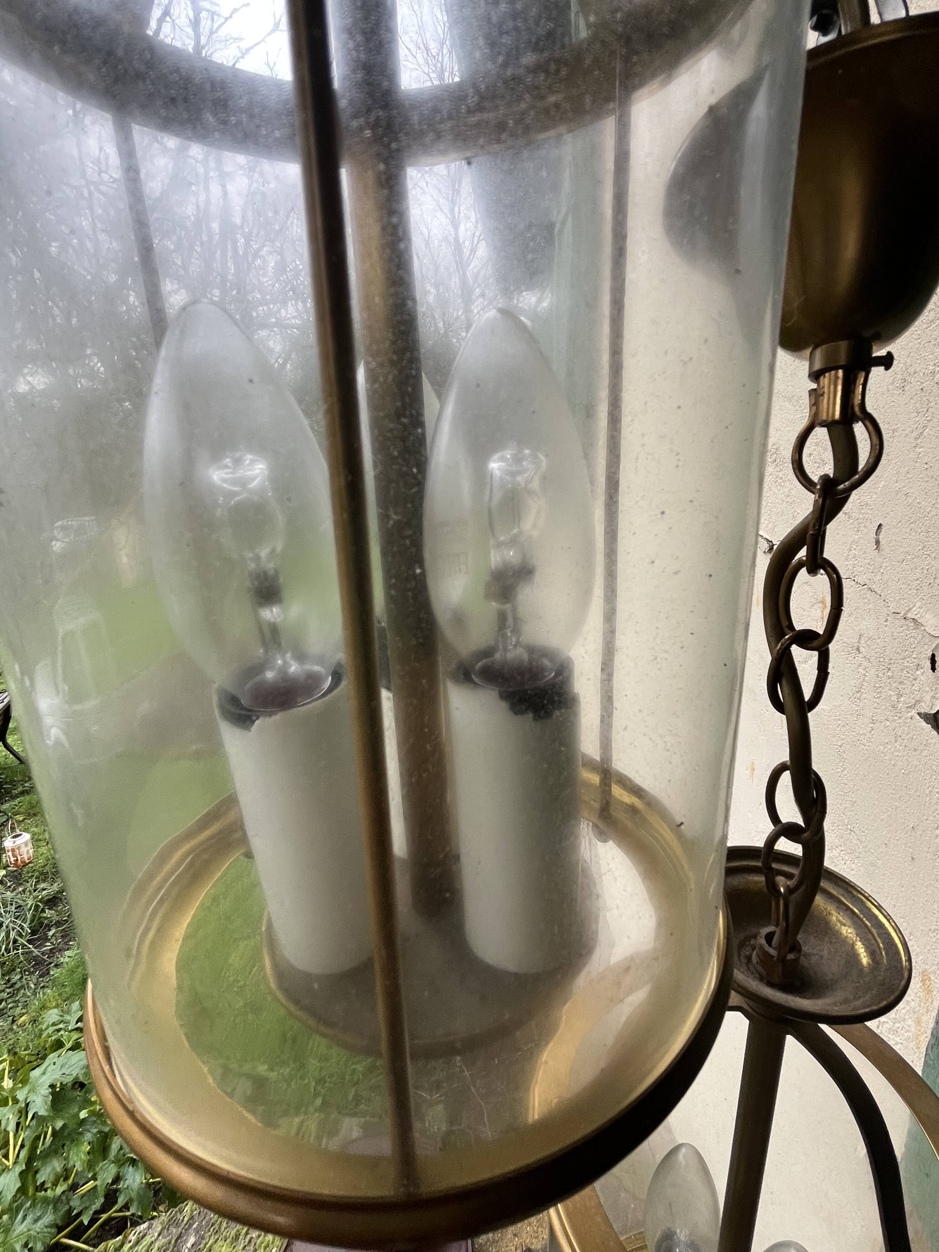 Pair of glass and brass chandeliers