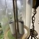 Pair of glass and brass chandeliers