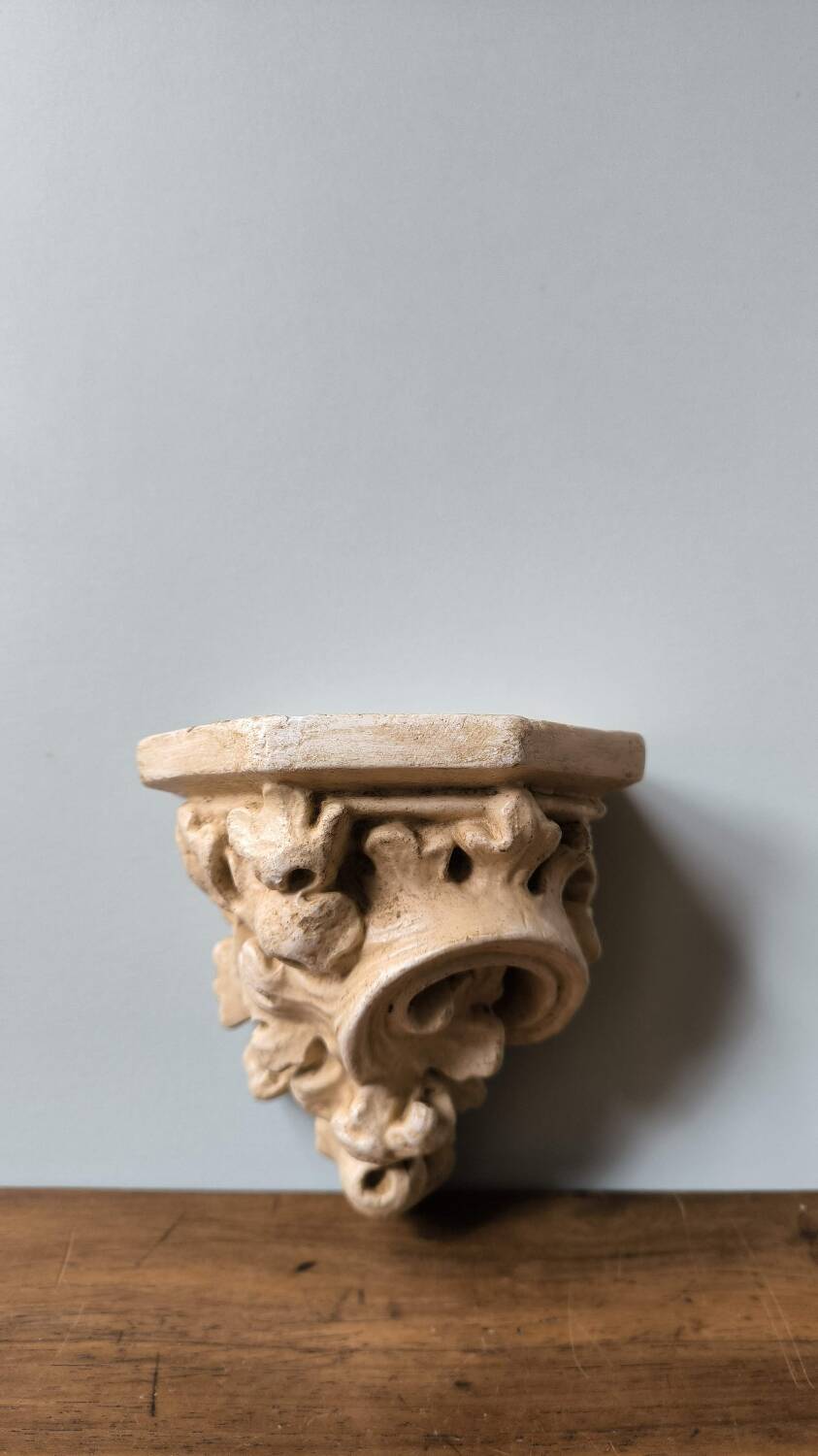 Small wall console shelf in vintage patinated plaster with baroque foliage