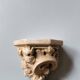 Small wall console shelf in vintage patinated plaster with baroque foliage