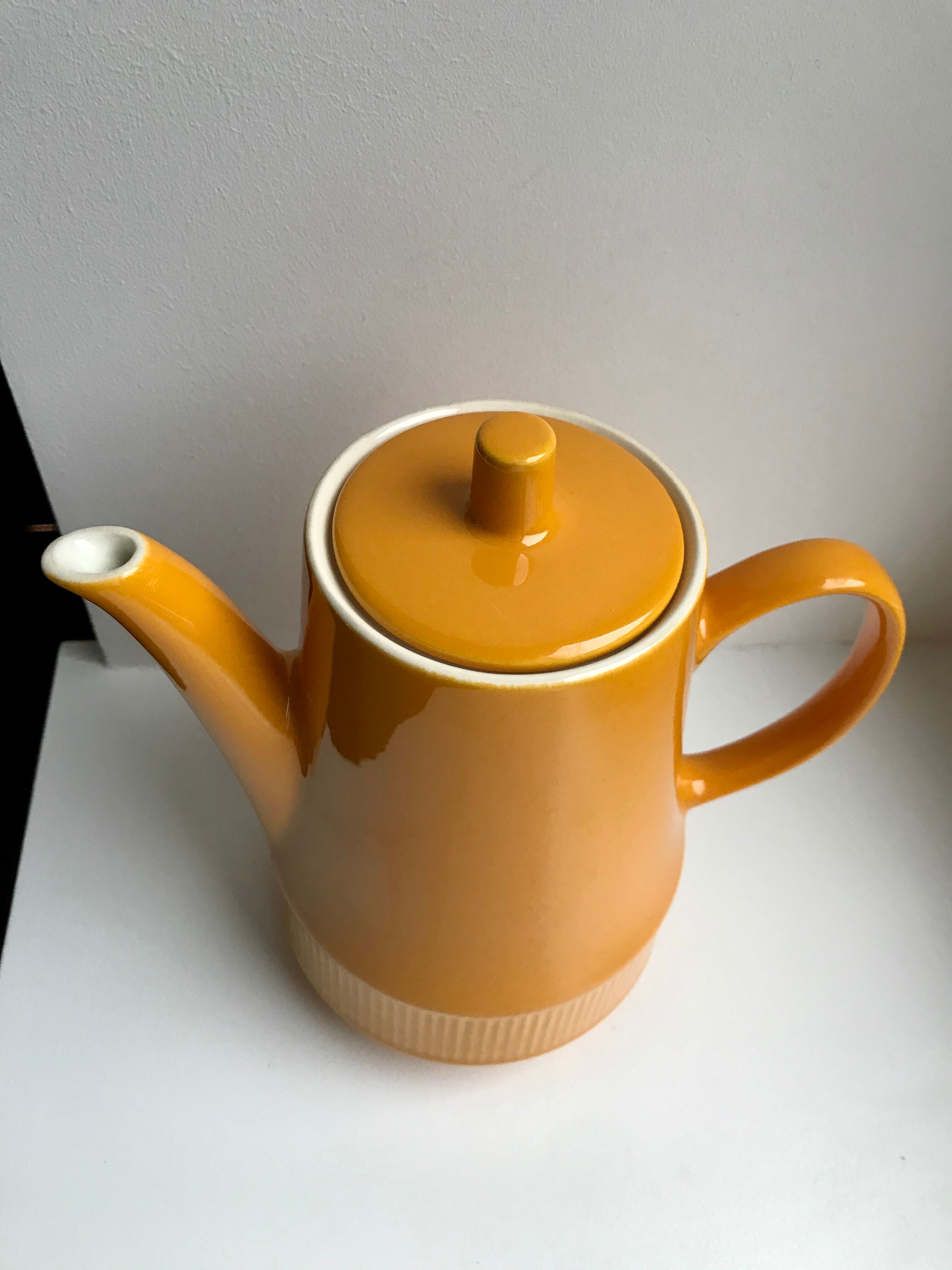 Vintage ceramic yellow-orange teapot, coffee maker