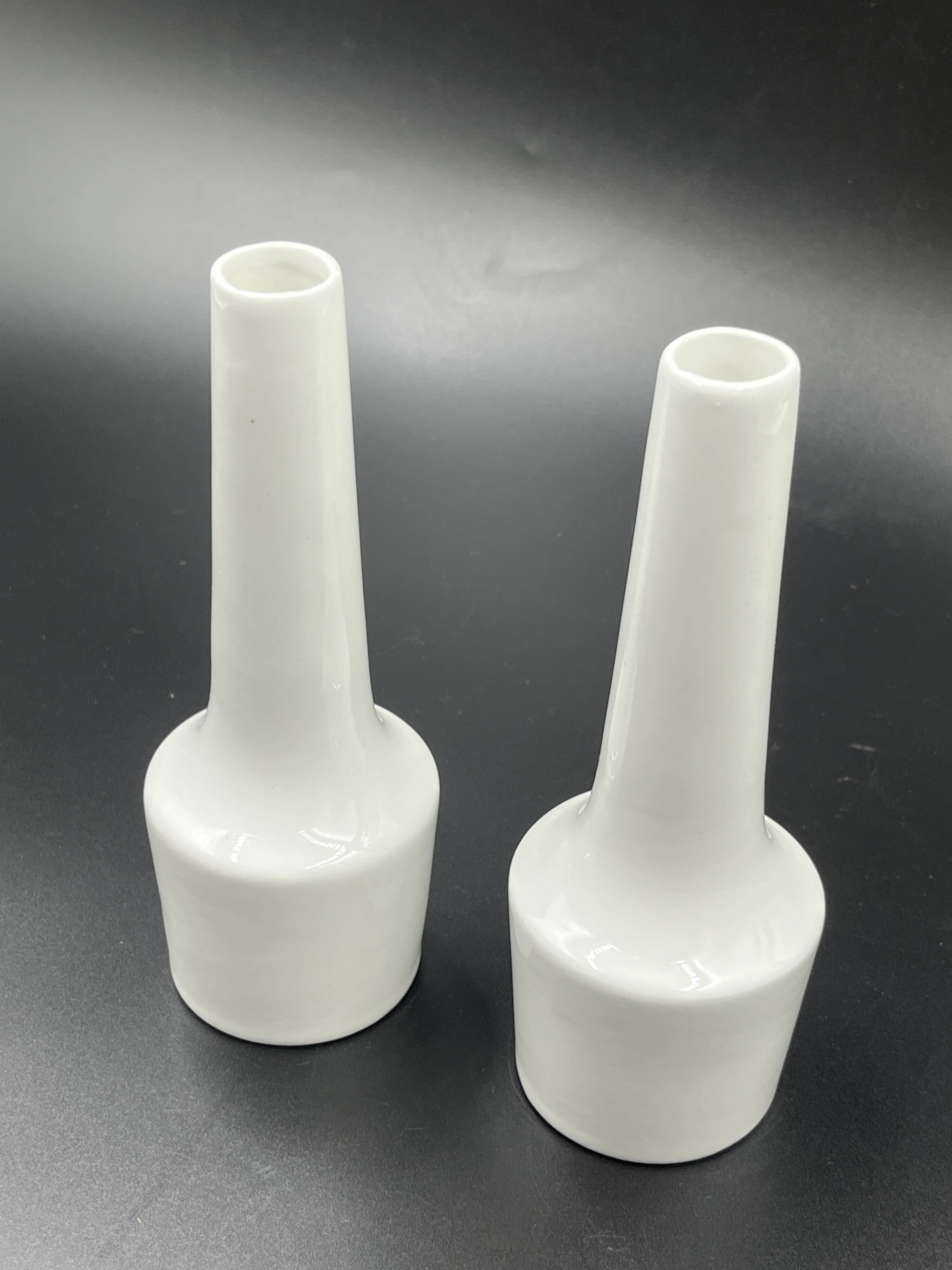 Pair of vintage white ceramic bud vases