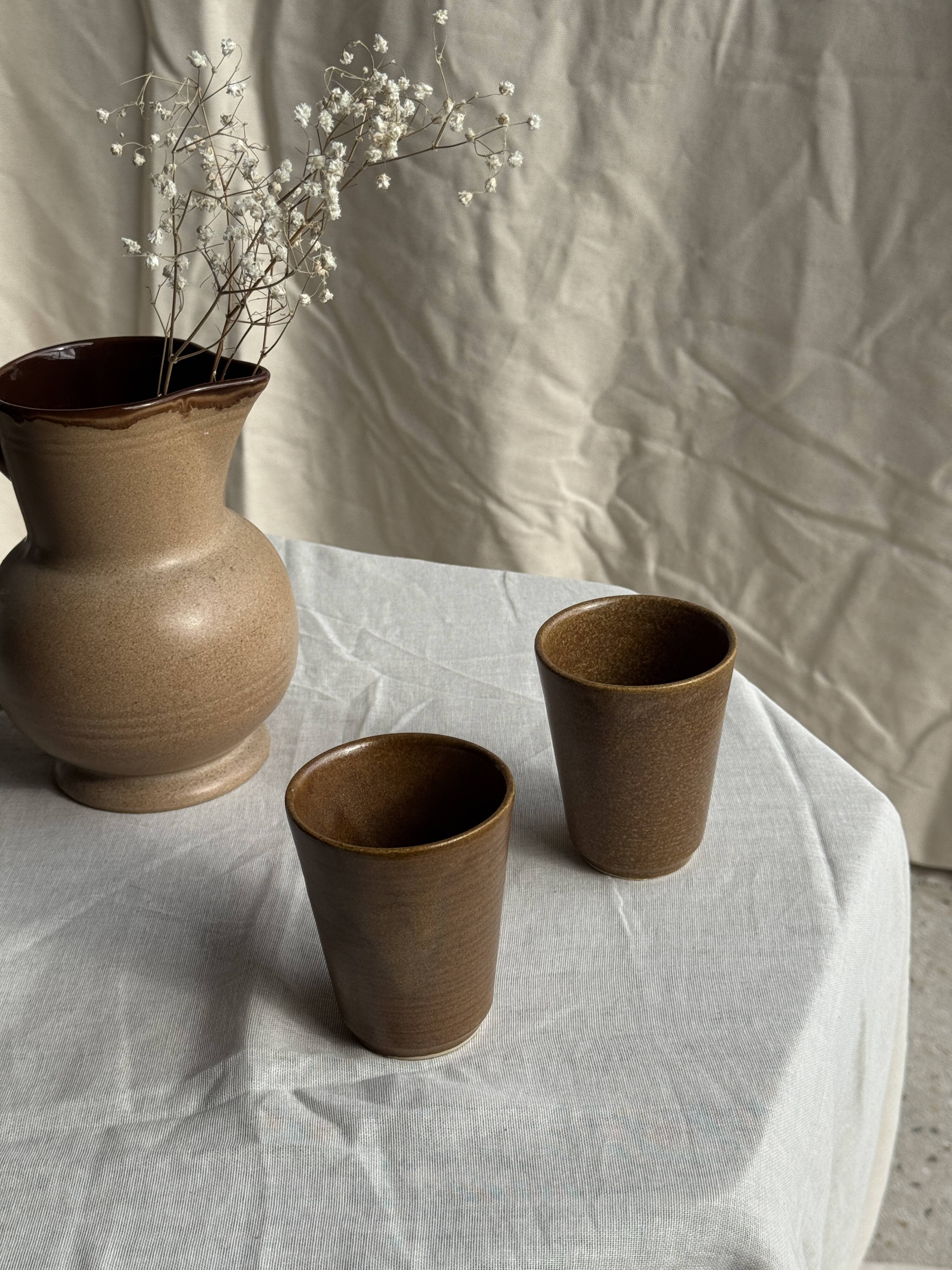 Set of 10 small stoneware mugs from Digoin.