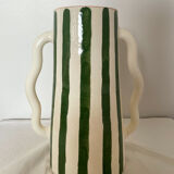 Handmade green and white striped ceramic vase with abstract corrugated handheld