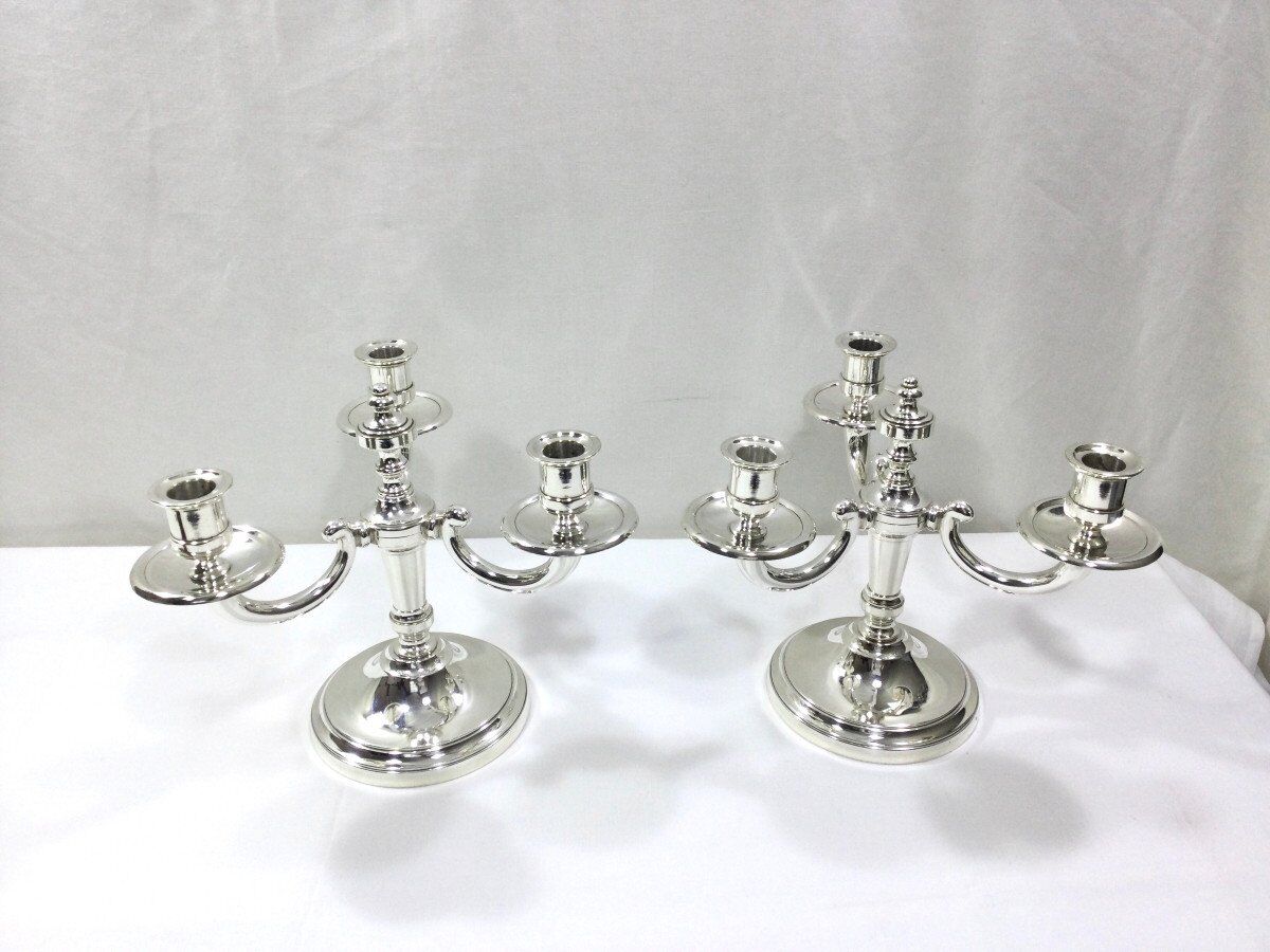 Pair of silver bronze candelabras