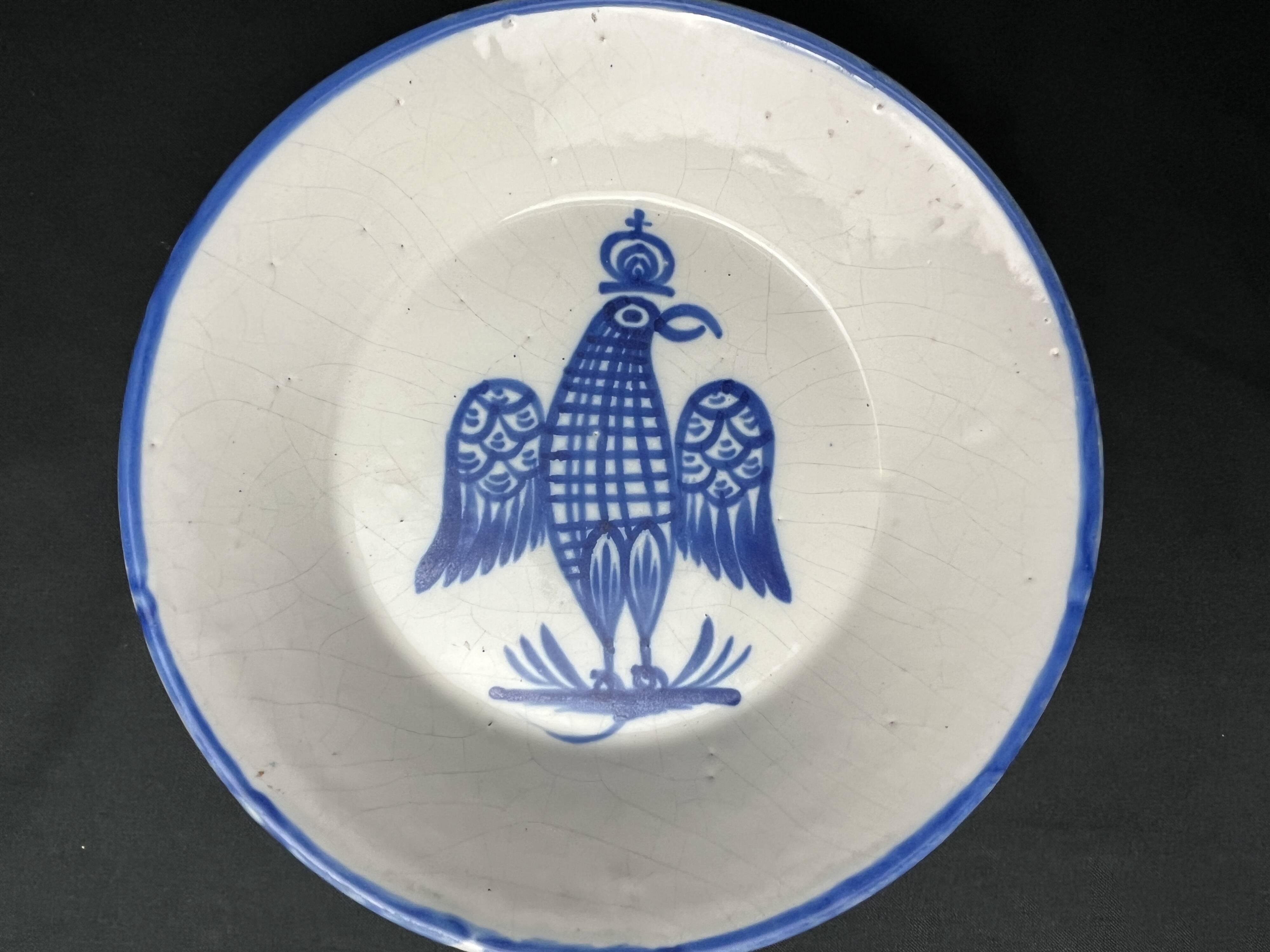 Besançon, dish decorated with a blue eagle, early 19th century