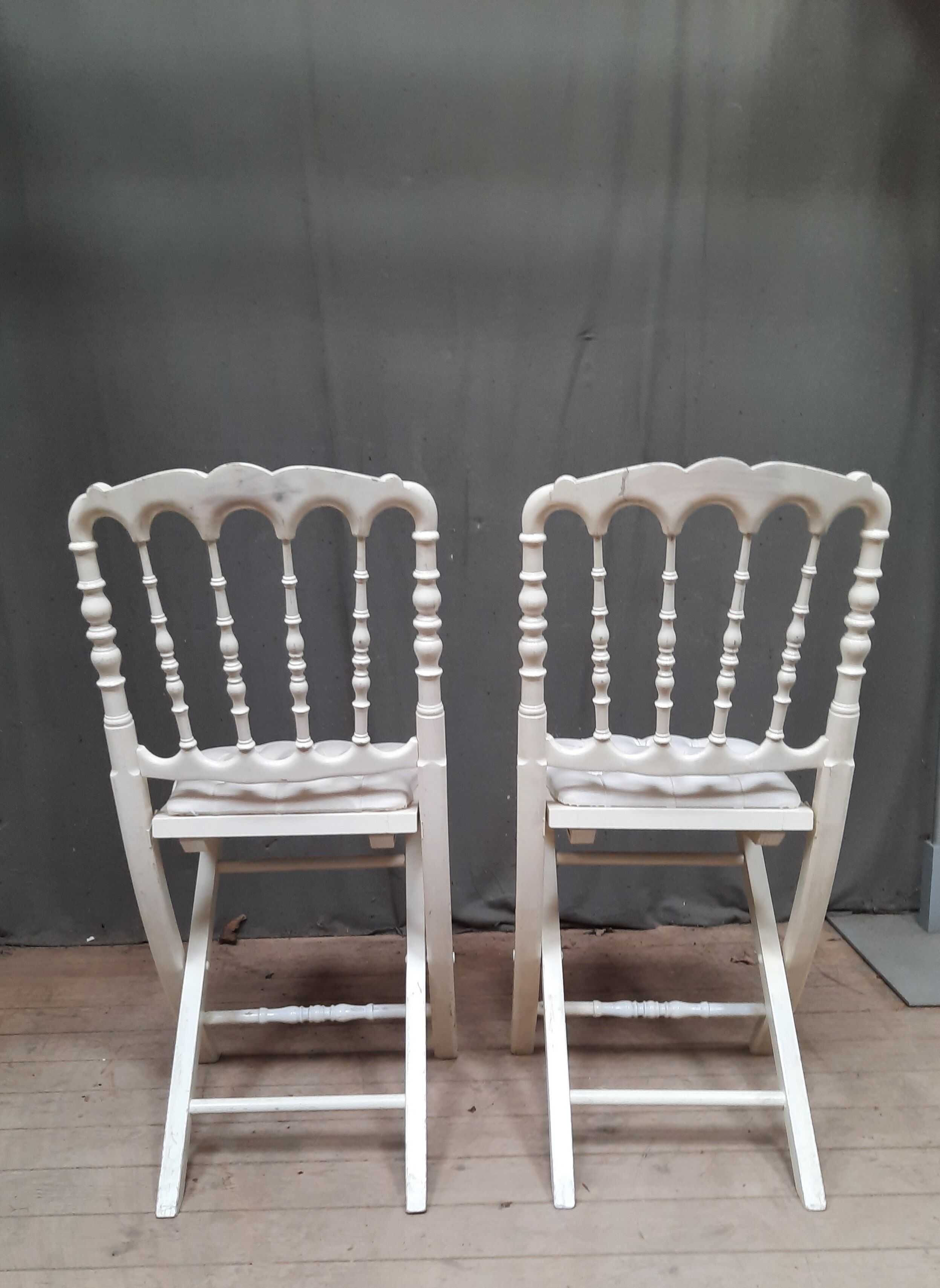 Pair of upholstered folding chairs