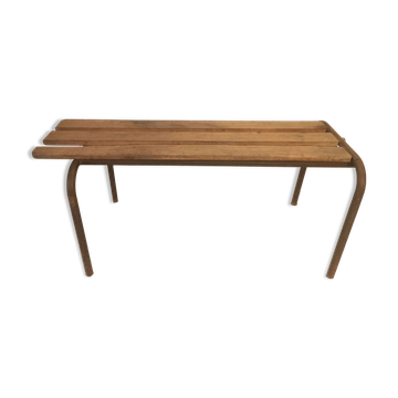Old bench wooden slats and tubular metal base
