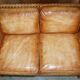 Two-seater leather canapé, hand-tanned, Edwardian style with studs.
