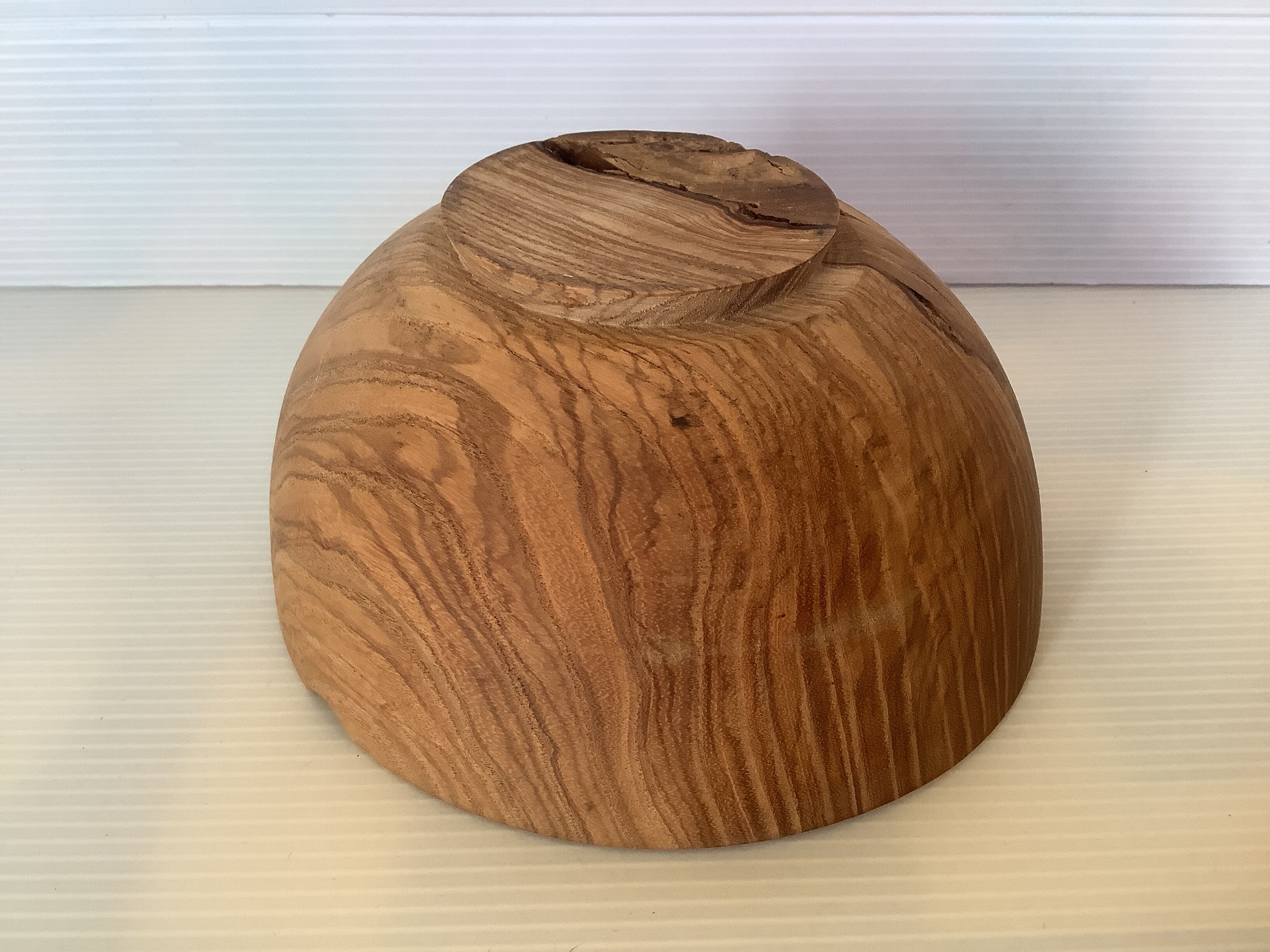 Mortier en bois avec un pilon