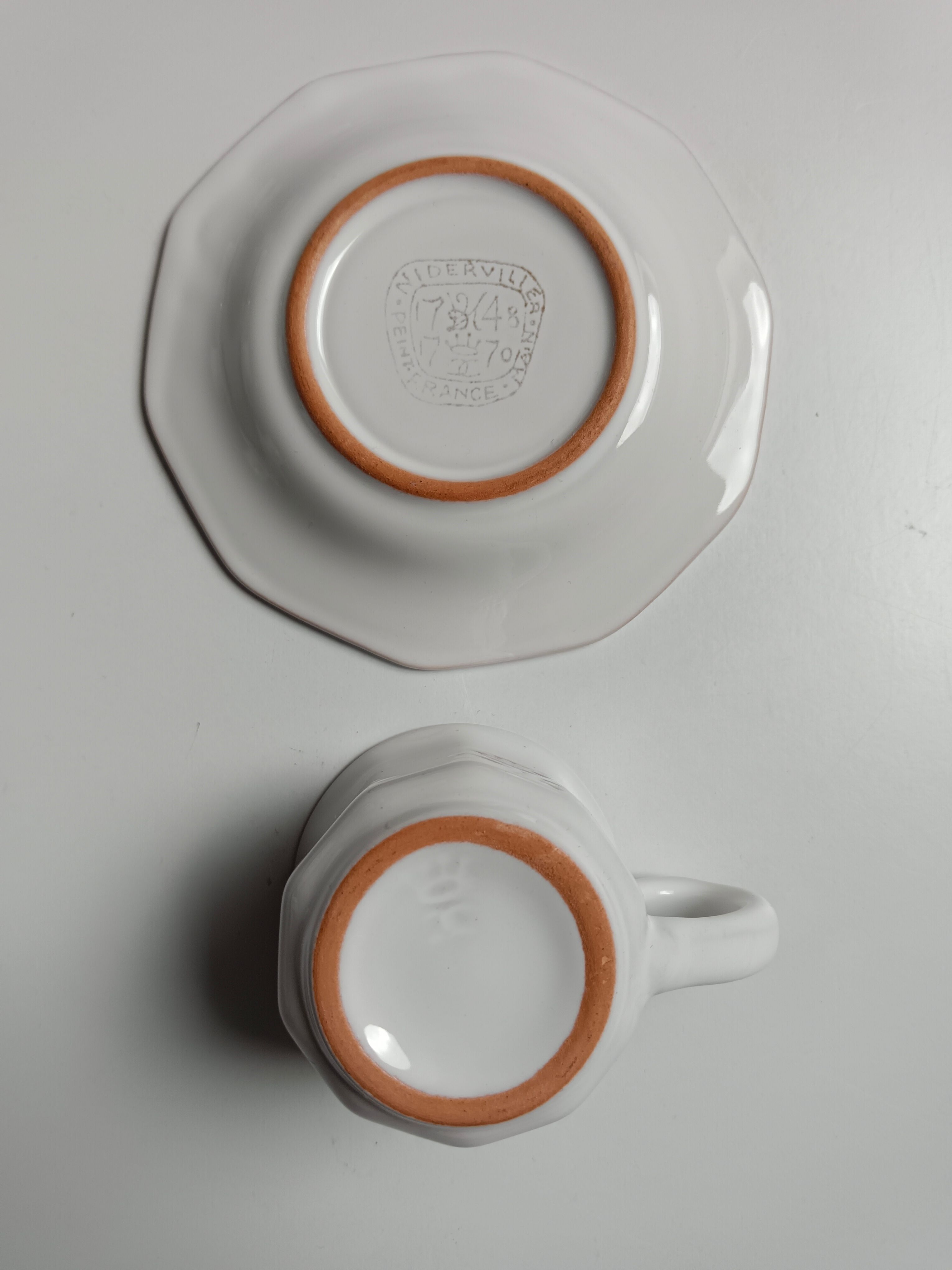 6 tasses Niderviller blanches et roses à décor de fleurs