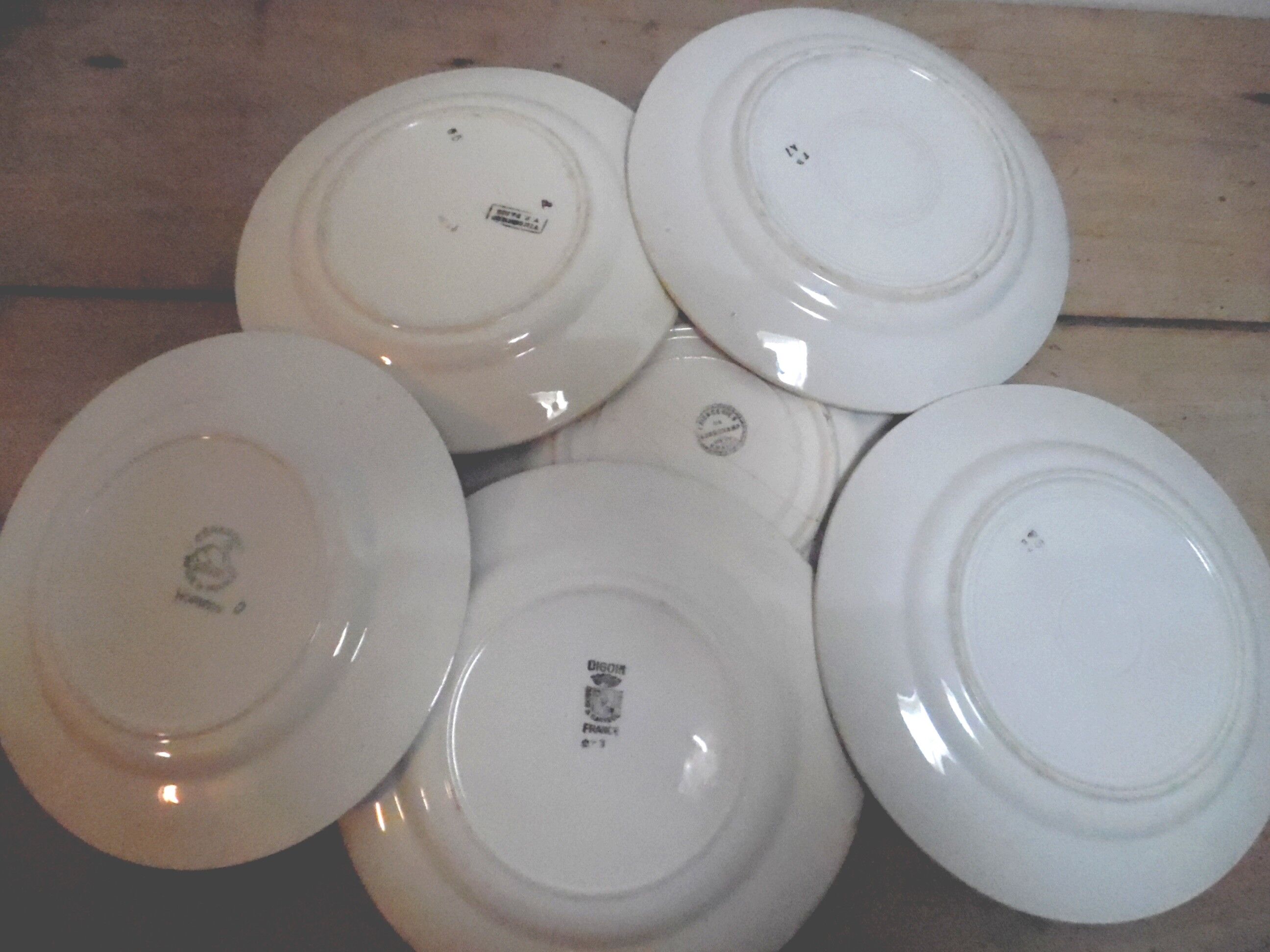 Six plates mismatched earthenware