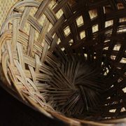 Vintage high round wicker basket with openwork.