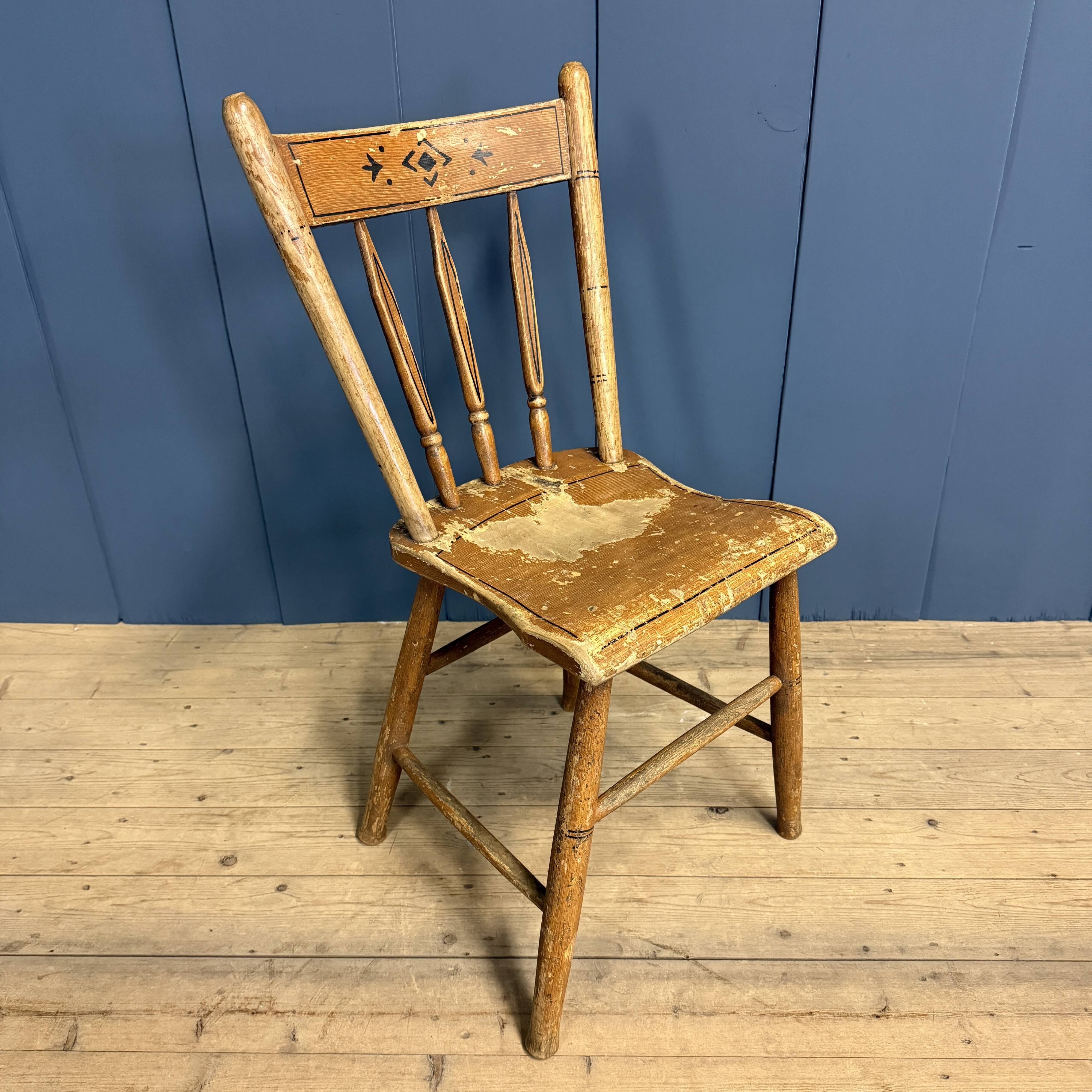 Set of four painted Dutch kitchen chairs.