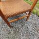 Scandinavian armchair of the 50s in cherry tree sitting in rope