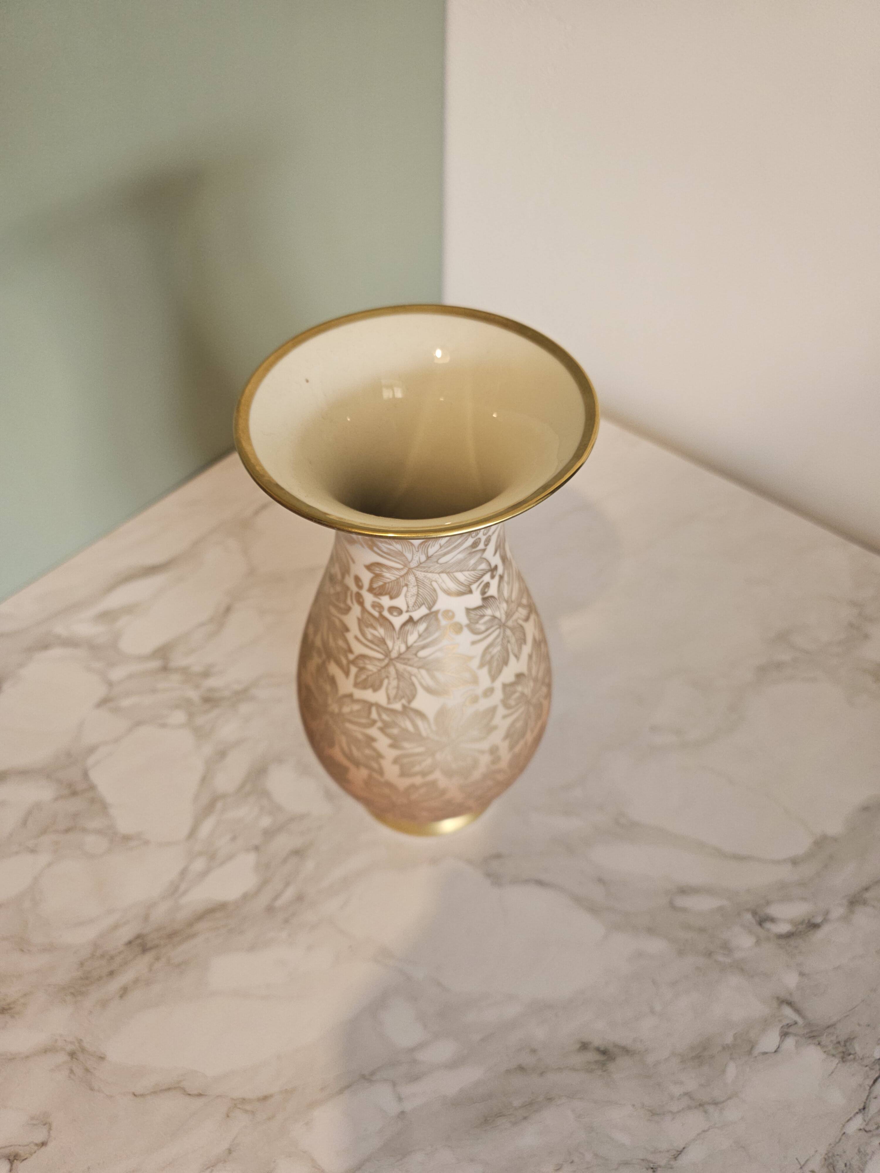 Porcelain vase with golden floral decoration by Johann Seltmann