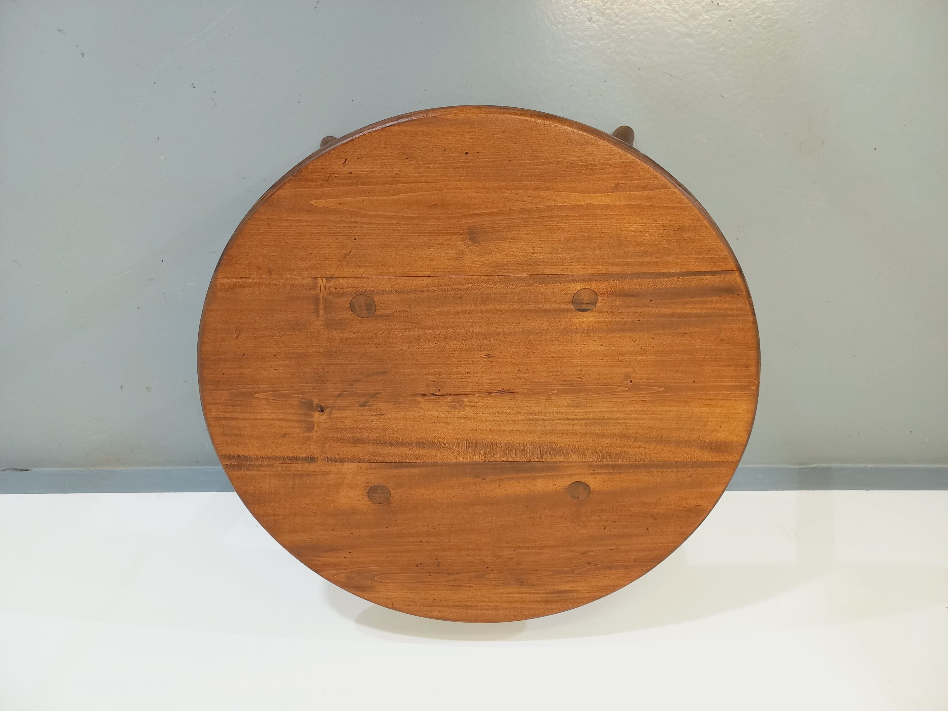 Vintage round brutalist coffee table in solid oak wood from the 50s