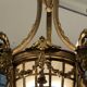 Joli lustre XIXe de style Louis XVI en bronze doré