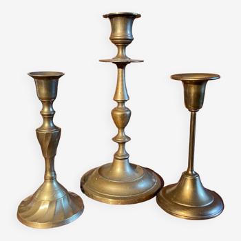 Trio of brass candlesticks
