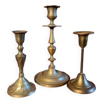 Trio of brass candlesticks