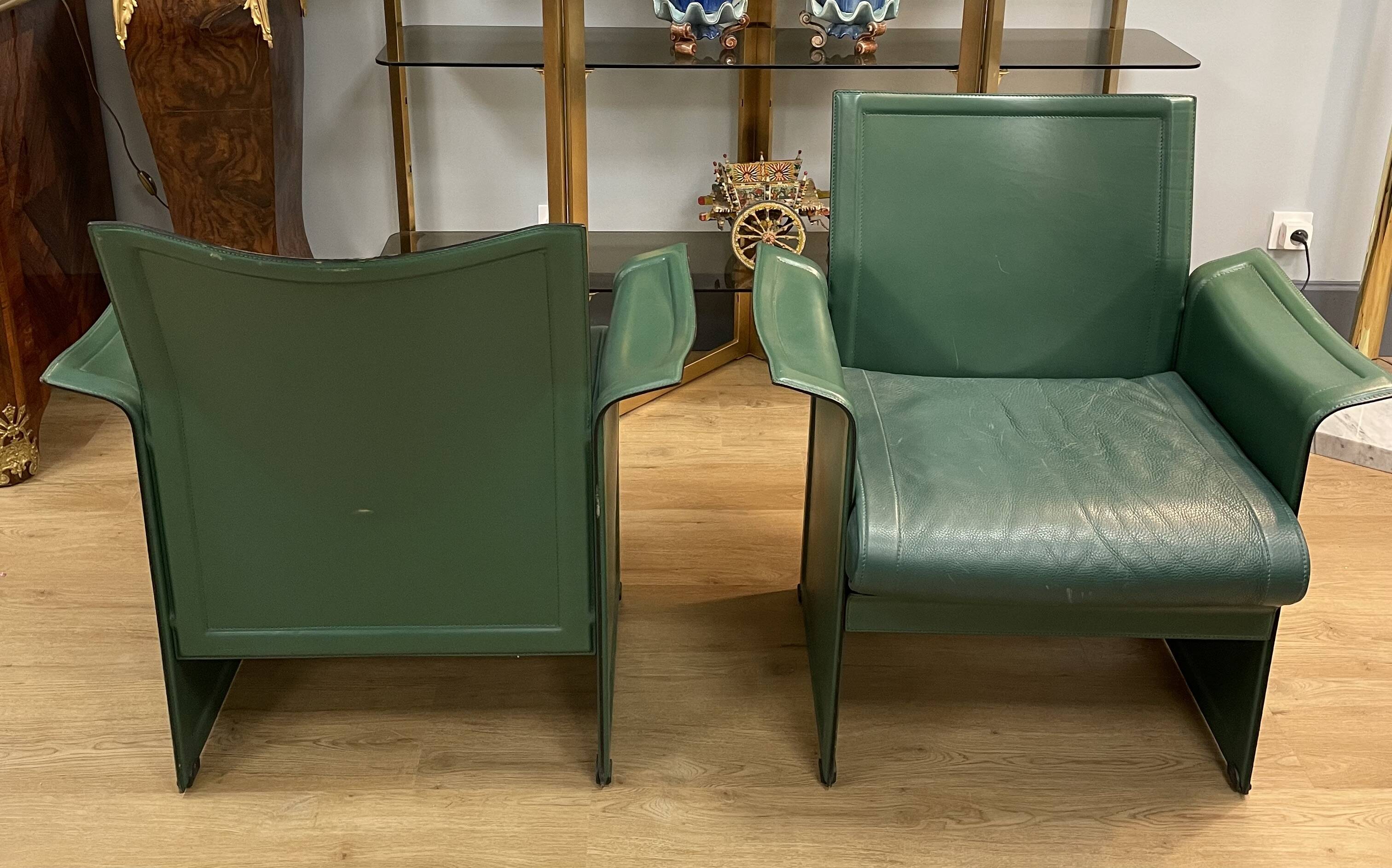 Pair of green leather armchairs from the 70s