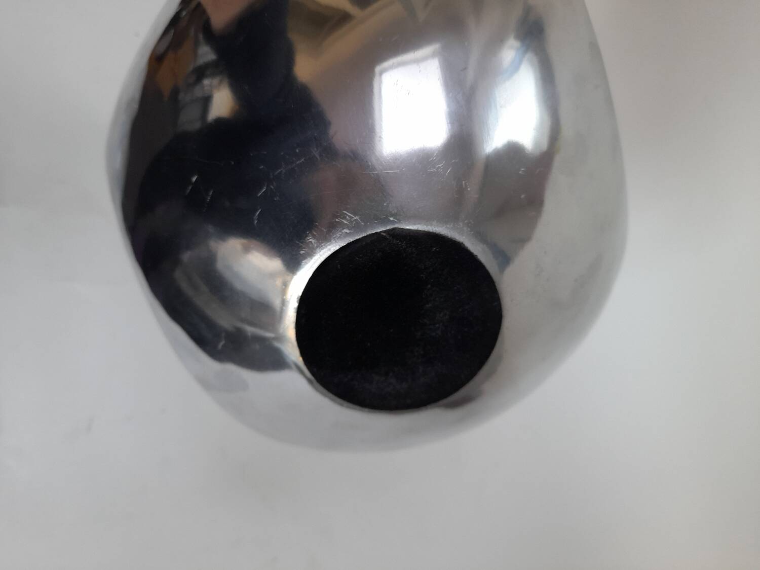 Asymmetrical aluminium fruit dish from the 90s.