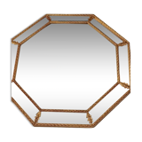 Octagonal mirror with golden wood frame