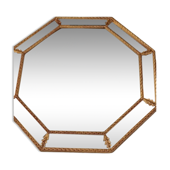 Octagonal mirror with golden wood frame