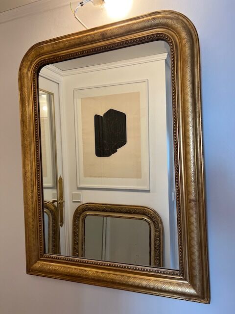 Old mirror Louis-Philippe in gilded wood