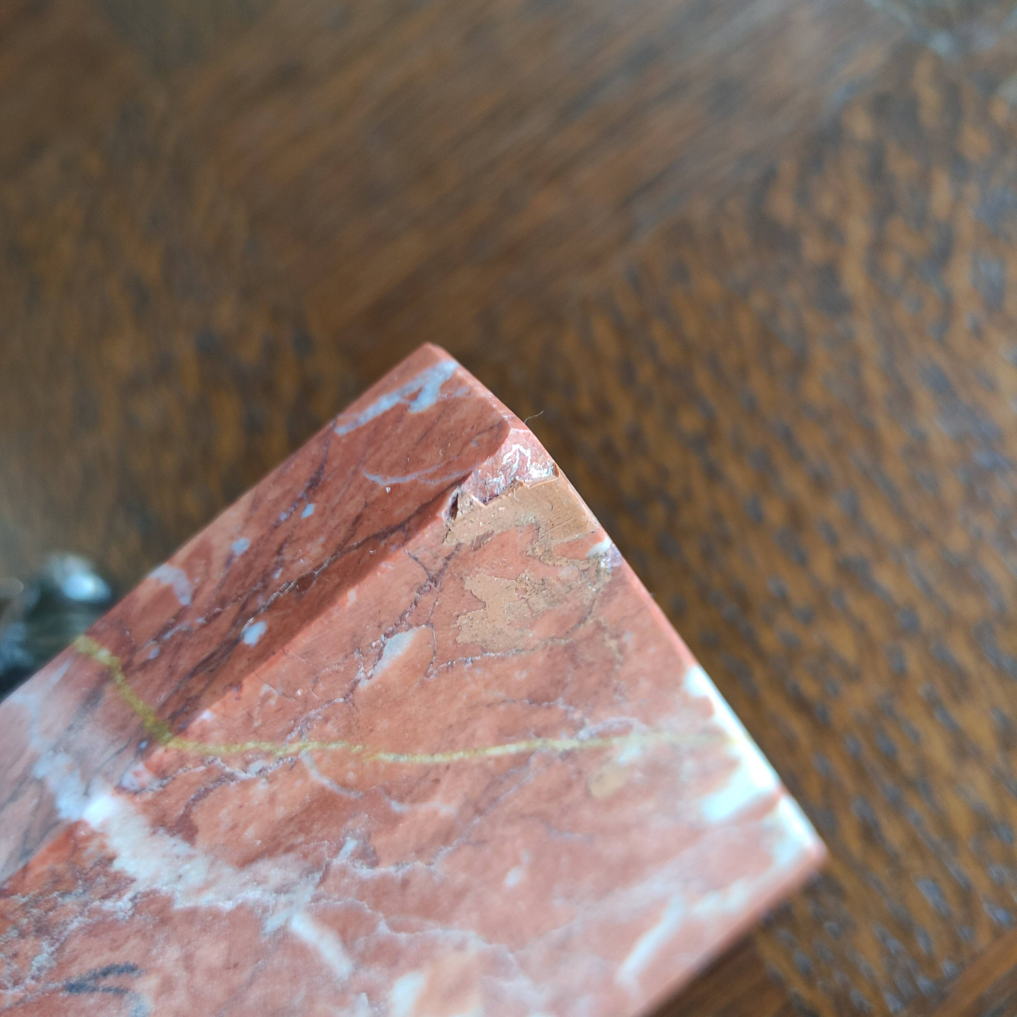 Zinc art bookends in the shape of birds on red marble - warblers