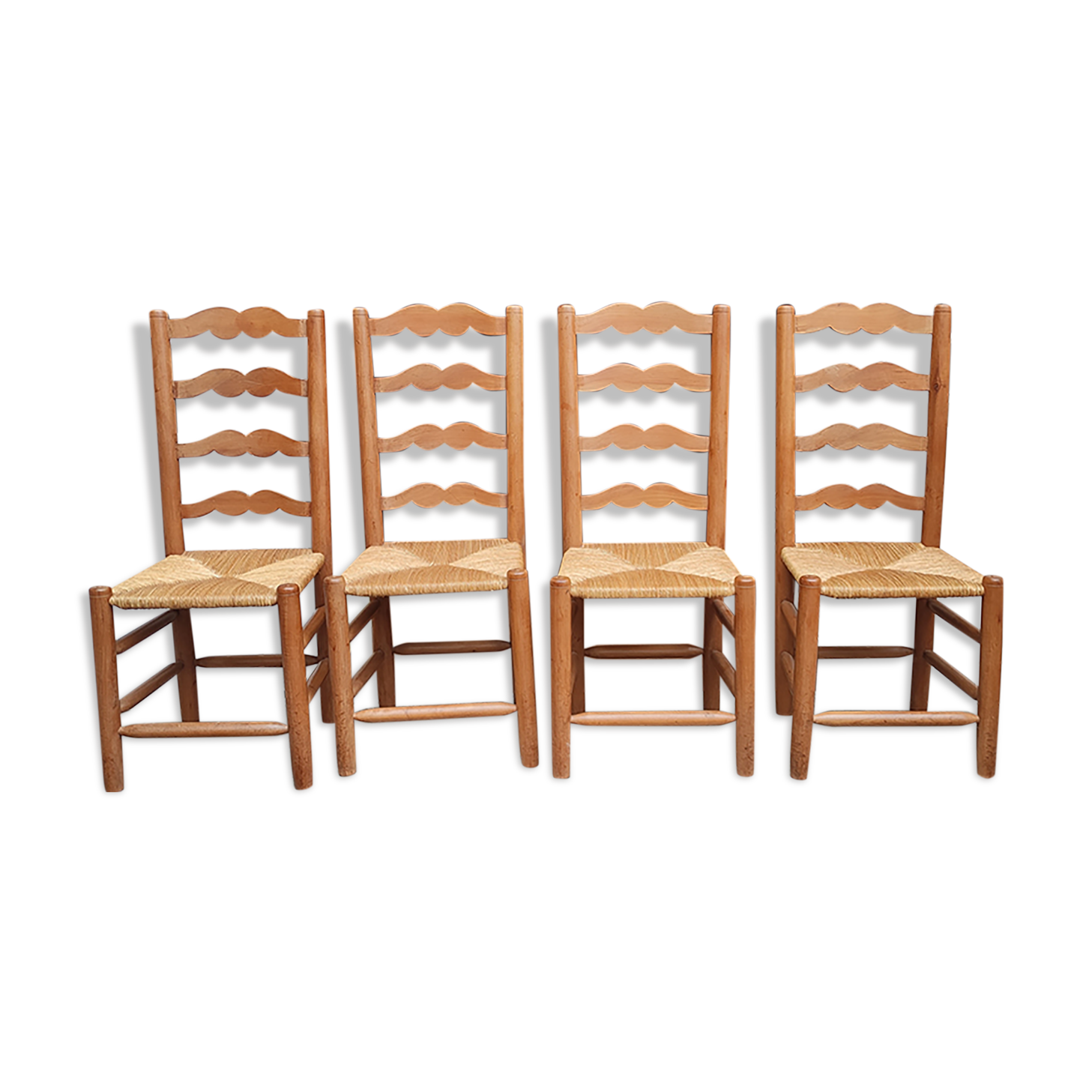 Series of 4 antique mulched chairs