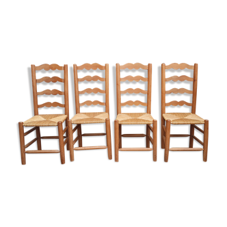 Series of 4 antique mulched chairs