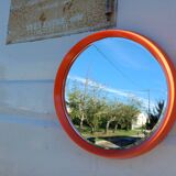 Vintage round plastic orange mirror
