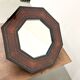 Octagonal wooden mirror by Jean-Claude Mahey