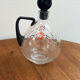 Enamelled glass carafe 1920